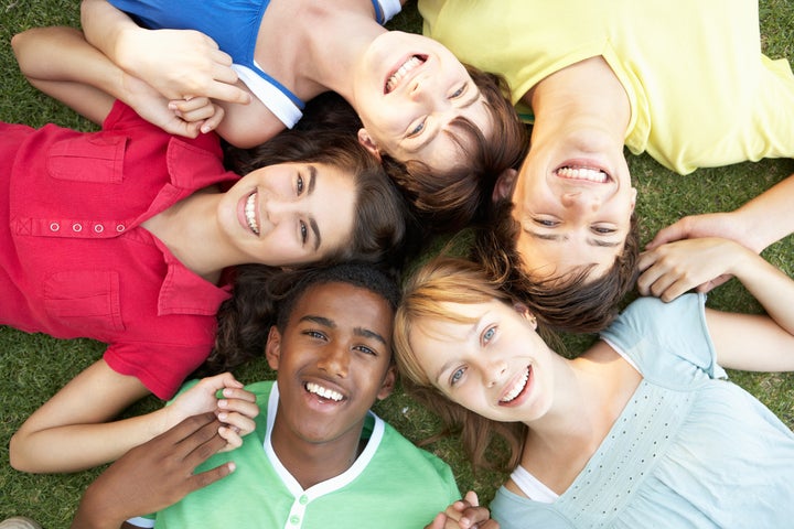 group of teenagers looking up...