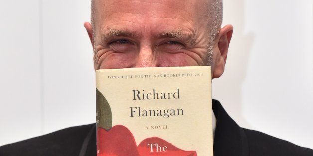 Australian author Richard Flanagan poses for pictures after winning the 2014 Man Booker Prize for his book 'The Narrow Road to the Deep North' in Central London on October 14, 2014. AFP PHOTO/BEN STANSALL (Photo credit should read BEN STANSALL,BEN STANSALL/AFP/Getty Images)