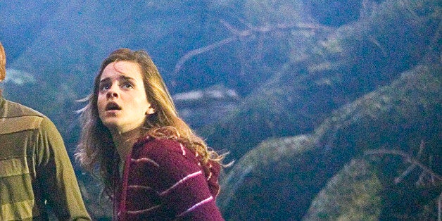 ** FILE ** In this image originally released by Warner Bros., Daniel Radcliff, portraying Harry Potter, left, Rupert Grint, portraying Ron Weasley, center, and Emma Watson as Hermione Granger are shown in a scene from the film, "Harry Potter and the Order of the Phoenix". Warner Bros. says it's bumping "Harry Potter and the Half-Blood Prince" from its planned November release into next summer. The sixth installment in the blockbuster franchise about boy wizard Harry now will open July 17 rather than Nov. 21, the studio said Thursday, Aug. 14. (AP Photo/Warner Bros., Murray Close) ** NO SALES **