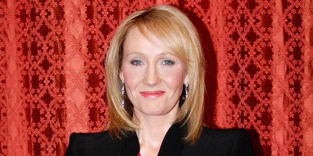 British writer J.K. Rowling poses after she was awarded with the medal of Knight in the Legion of Honor order by French Presi