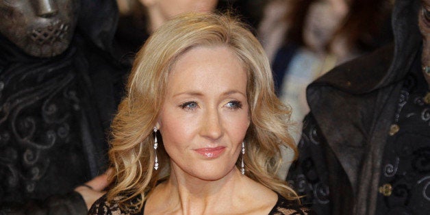 British author JK Rowling poses for the photographers as she attends the world premiere of the latest film' Harry Potter and The Deathly Hallows', at a cinema in central London, Thursday, Nov. 11, 2010. (AP Photo/Lefteris Pitarakis)