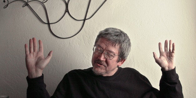 TO GO WITH STORY TITLED AFGHAN AMERICAN WRITER--Afghan-American writer Tamim Ansary gestures during an interview April 15, 2002, at his home in San Francisco. Ansary, 53, who responded to the Sept. 11 terrorist attacks with a widely circulated e-mail, has expanded on his electronic dispatch by publishing a memoir, "West of Kabul, East of New York: An Afghan American Story." (AP Photo/Ben Margot)