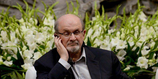 Indian born British writer Salman Rushdie smiles during a talk for the XV anniversary of the 'Casa Refugio Citlatepetl' at the Museo de la Ciudad in Mexico City, on October 5, 2014. Rushdie is in a two-day visit. AFP PHOTO/ALFREDO ESTRELLA (Photo credit should read ALFREDO ESTRELLA/AFP/Getty Images)