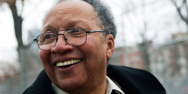 FILE - This Dec. 13, 2010 file photo shows author Walter Dean Myers tours his old Harlem neighborhood in New York. Myers, a b