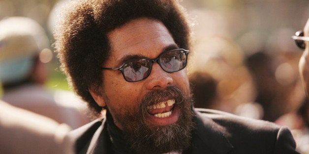 Scholar Cornel West speaks with members of the media, Saturday, Oct. 15, 2005, on the lawn of the U.S. Capitol in Washington. Nation of Islam leader Louis Farrakhan holds his Millions More Movement march on Saturday on the National Mall. (AP Photo/Haraz N. Ghanbari)