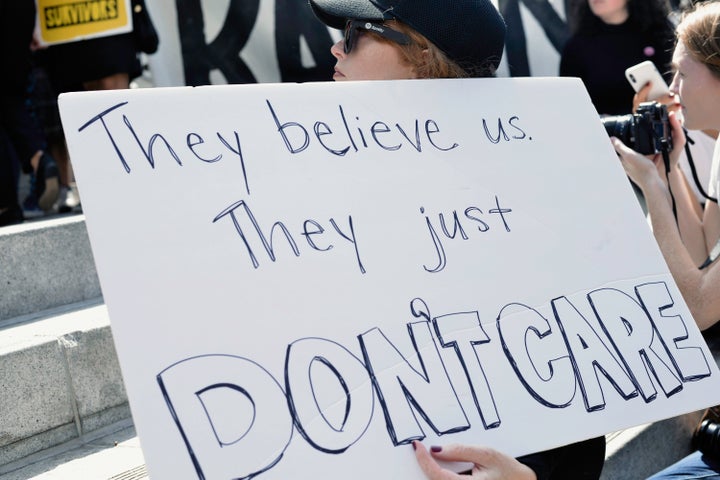 Activists participate in the "Believe Survivors. STOP Kavanaugh." rally hosted by Time's Up & Partners at Los Angeles City Hall on Sept. 28.