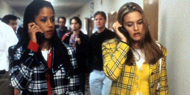 Stacey Dash and Alicia Silverstone walking and talking on their mobile phones in a scene from the film 'Clueless', 1995. (Photo by Paramount Pictures/Getty Images)