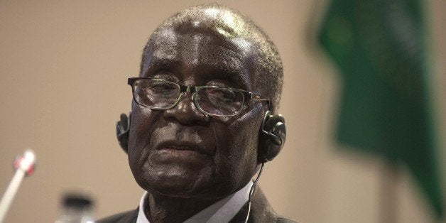 JOHANNESBURG, SOUTH AFRICA - JUNE 15: Zimbabwe's President and Head of the African Union Robert Mugabe seen during a press conference after the closing ceremony of the 25th African Union Summit being held at the Sandton Convention Centre in Sandton, Johannesburg on 15 June 2015. (Photo by Ihsaan Haffejee/Anadolu Agency/Getty Images)