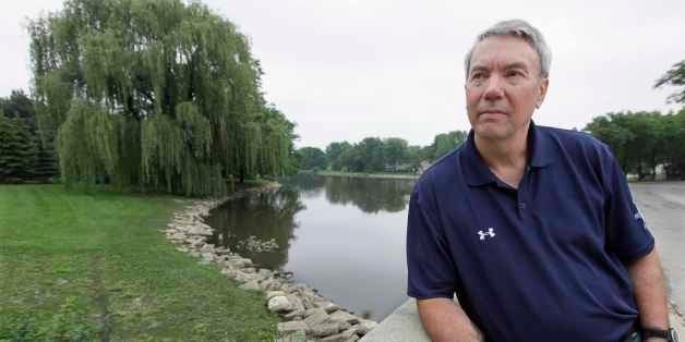 This June 10, 2011 photo shows David Kaczynski in a park near a family member's home in Wheaton, Ill. Kaczynski gives talks a