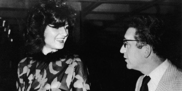 Greek-born American columnist and political commentator Arianna Huffington and her then boyfriend and co-host British journalist Bernard Levin (1928 - 2004) talk to each other, 1970s. (Photo by Express Newspapers/Getty Images)