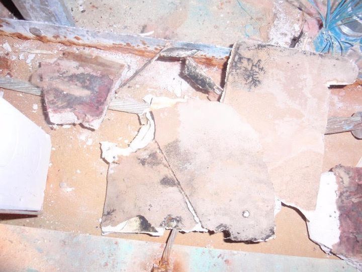 A photo taken May 21 that, according to Brown and McGlothin, shows black mold still present underneath the prison control room in the remnants of sheetrock.