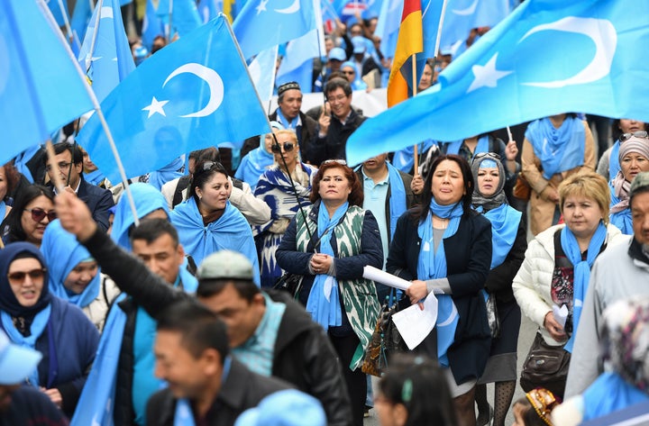 Ethnic Uighurs protesting in Brussels on April 27, 2018, urge the European Union to call upon China to respect human rights in the Chinese Xinjiang region.