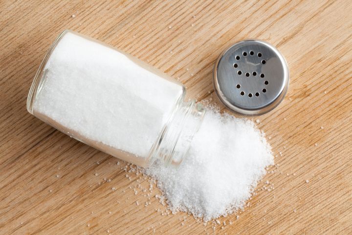 salt shaker on wooden table