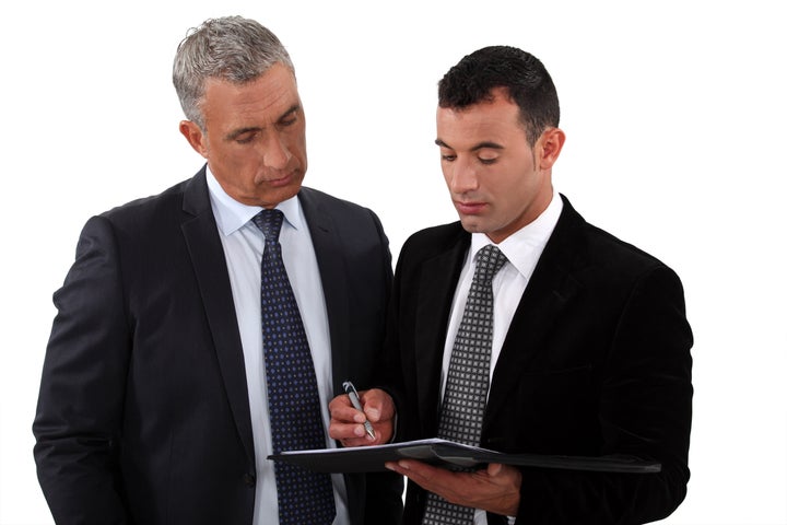 businessmen looking at a...