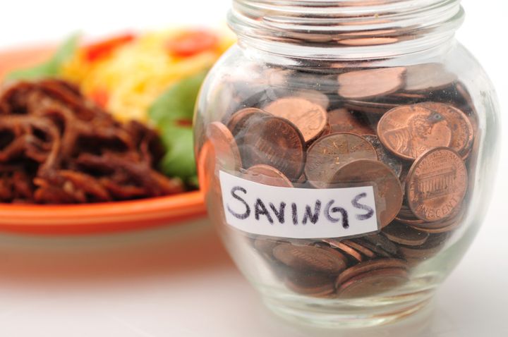 saving money with a jar of...