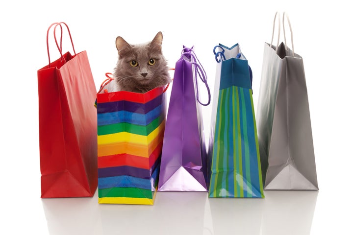 assorted colored shopping bags...