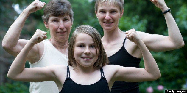 6/20/09 - MISSISSAUGA, ONTARIO - Claire Styba, 10, along with grandmother Doreen Sigmund (left) and mom Leslie Styba, flex th