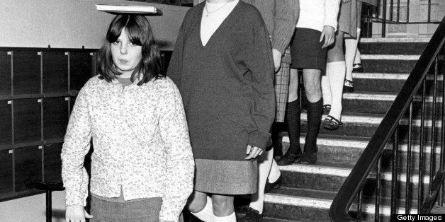 With books balanced on their heads, secondary school girls at Whitworth learn the art of deportment in the 'Modern Studies' program, Whitworth, England, January 21, 1967. (Photo by Underwood Archives/Getty Images)