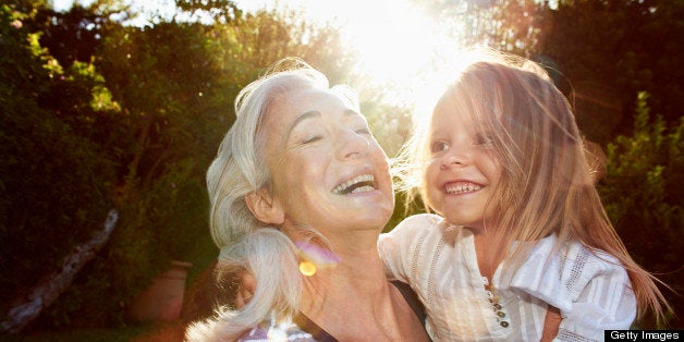 Portrait of grandmother and girl (4 - 5 y)