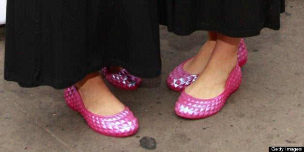 NEW YORK, NY - JULY 31: 'DC Cupcakes' Sophie LaMontagne and Katherine Kallinis celebrate Crocs Tenth anniversary by ringing
