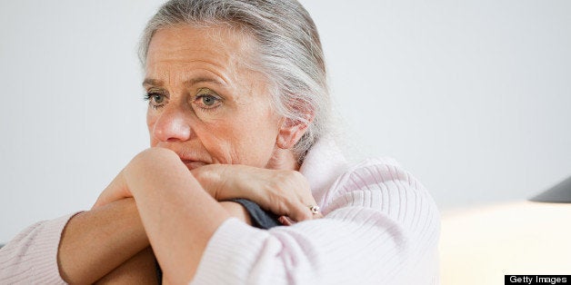 Mature woman looking anxious