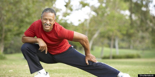 senior man exercising in park