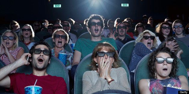 People shocked while watching a movie