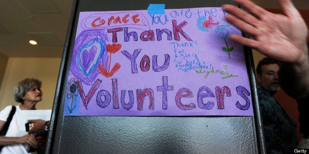 PALMER, CO - JUNE 15: Black Forest Fire evacuees were greeted to sign thanking volunteers at a community meeting at Palmer Ridge High School in Monument Colorado Saturday, June 15, 2013. The fire is 45% contained, but has claimed two lives and over 450 homes. (Photo By Andy Cross/The Denver Post via Getty Images)