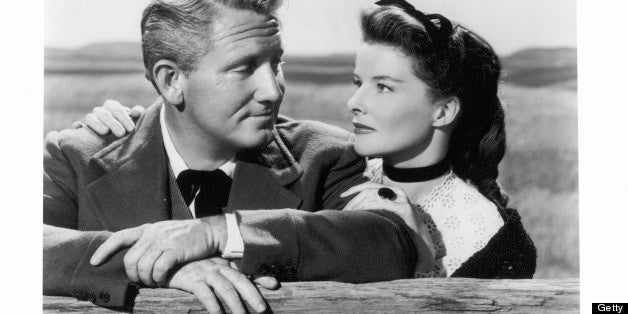 Spencer Tracy and Katharine Hepburn gazing into one an other's eyes in a scene from the film 'Sea Of Grass', 1947. (Photo by