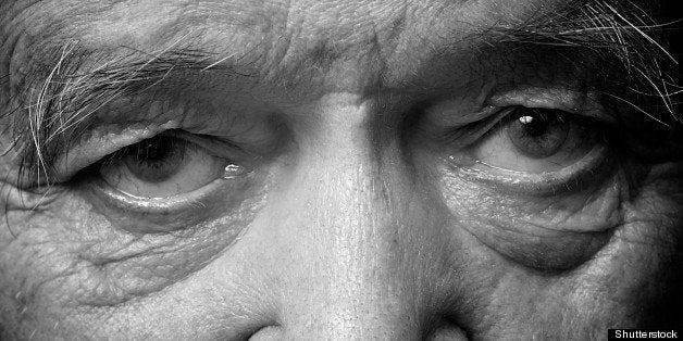 old man face part closeup eyes...