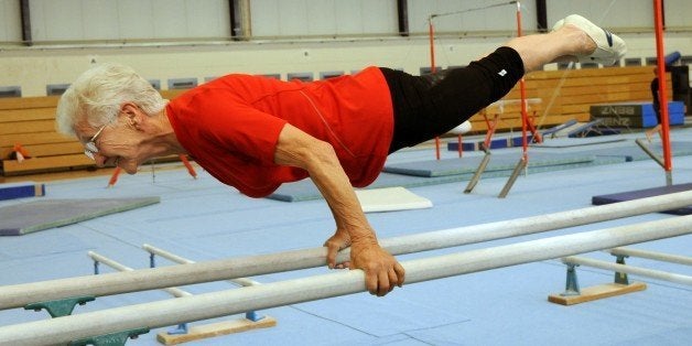 The 86-year-old Johanna Quaas, the oldest active gymnast in the world according to ??the Guinness Book of World Records, attends a weekly exercises on uneven bars on November 6, 2012 in her hometown Halle, center Germany. The gymnast who celebrates her 87 birthday on November 20 still takes part in competitions. AFP PHOTO/ Waltraud Grubitzsch/GERMANY OUT (Photo credit should read WALTRAUD GRUBITZSCH/AFP/Getty Images)