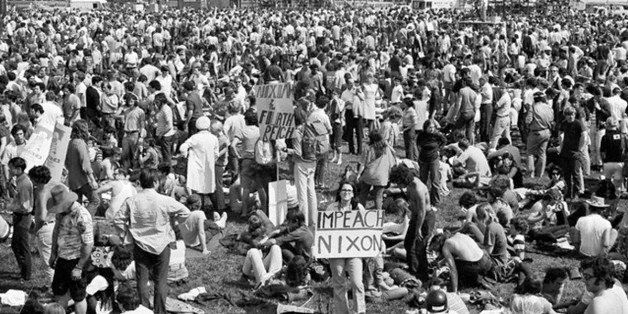 12 May 1970, Washington, DC, USA --- WASHINGTON-5/12/70-: Legend on placards reflect the views of bearers as hundreds of thousands of angry young Americans descend on nation's capitol to protest U.S. involvement in Indochina May 9th. They came also to protest the slaying of four Kent State University students by Ohio national guardsmen earlier in the week. --- Image by © Bettmann/CORBIS