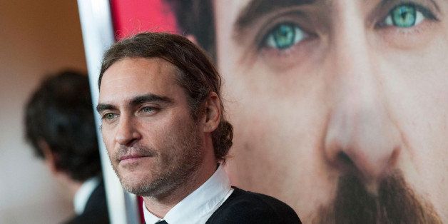 LOS ANGELES, CA - DECEMBER 12: Actor Joaquin Phoenix attends the premiere of Warner Bros. Pictures' 'Her.' at DGA Theater on December 12, 2013 in Los Angeles, California. (Photo by Valerie Macon/Getty Images)