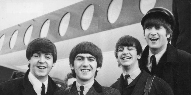 392279 03: FILE PHOTO: The Beatles, left to right, Paul McCartney, George Harrison, Ringo Starr and John Lennon (1940 - 1980) arrive at London Airport February 6, 1964, after a trip to Paris. Conflicting reports were released July 23, 2001 regarding Beatle George Harrison''s battle with cancer. Music producer Sir George Martin was quoted as saying that Harrison expects to die soon from his illnesses. The 58-year-old musician underwent treatment for a brain tumor at a clinic in Switzerland, and had surgery earlier this year for lung cancer. (Photo by Getty Images)