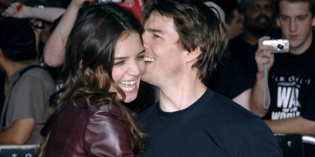 Katie Holmes and Tom Cruise during War of the Worlds Los Angeles Premiere and Fan Screening - Arrivals at Grauman's Chinese Theater in Los Angeles, California, United States. (Photo by Jeff Kravitz/FilmMagic)