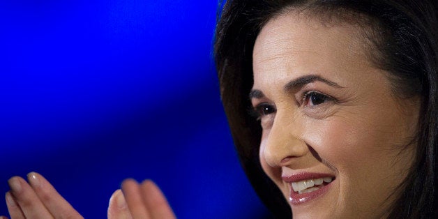 Sheryl Sandberg, chief operating officer of Facebook Inc., reacts during a demonstration at the DreamForce Conference in San