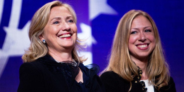 NEW YORK CITY- SEPTEMBER 22: Hillary Rodham Clinton (L), Secretary of State stands with her daughter Chelsea Clinton during the closing Plenary session of the seventh Annual Meeting of the Clinton Global Initiative (CGI) at the Sheraton New York Hotel on September 22, 2011 in New York City. Established in 2005 by former U.S. President Bill Clinton, the CGI assembles global leaders to develop and implement solutions to some of the world's most urgent problems. (Photo by Daniel Berehulak/Getty Images)