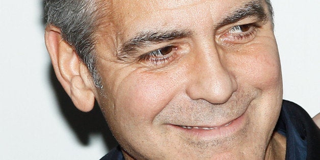 PARIS, FRANCE - FEBRUARY 12: George Clooney attends 'Monuments Men' Paris premiere at Cinema UGC Normandie on February 12, 2