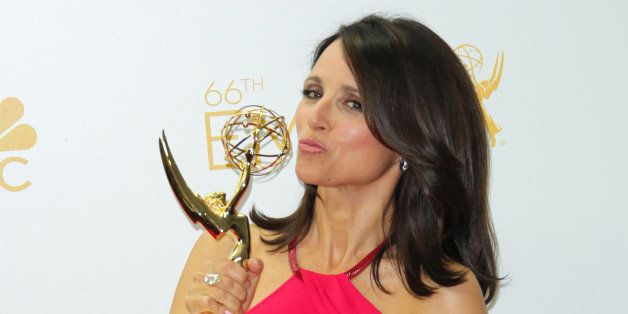 LOS ANGELES, CA - AUGUST 25: Actress Julia Louis-Dreyfus poses for photos in the press room at the 66th annual Primetime Emmy Awards at Nokia Theatre L.A. Live on August 25, 2014 in Los Angeles, California. (Photo by Paul Archuleta/FilmMagic)