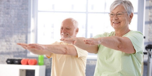 mature people exercising...