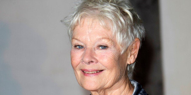 FILE - This Oct. 17, 2013 file photo shows British actress Judi Dench at the Globe Theatre in central London, for a Gala even