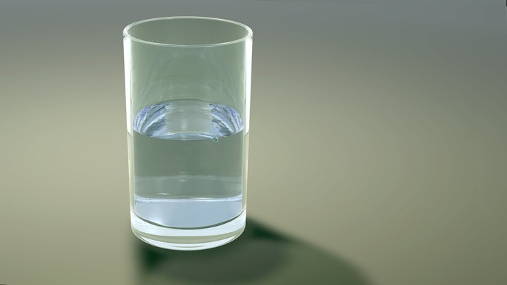 glass half full of water or...