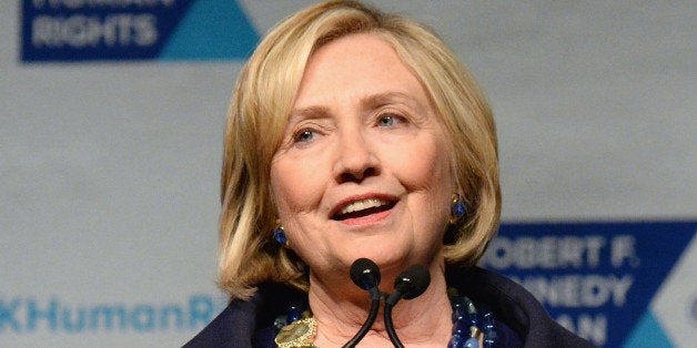 NEW YORK, NY - DECEMBER 16: Honoree Hillary Rodham Clinton speaks onstage at the RFK Ripple Of Hope Gala at Hilton Hotel Mid