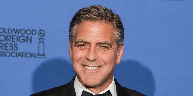 BEVERLY HILLS, CA - JANUARY 11: Actor/filmmaker George Clooney poses in the press room during the 72nd Annual Golden Globe Awards at The Beverly Hilton Hotel on January 11, 2015 in Beverly Hills, California. (Photo by George Pimentel/WireImage)