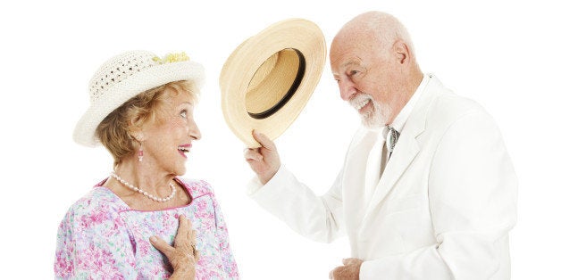 Southern gentleman tipping his hat to a pretty southern belle. Isolated on white