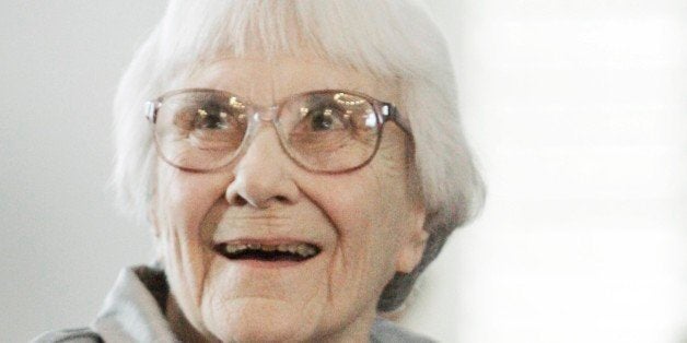 FILE - In this Aug. 20, 2007, file photo, author Harper Lee smiles during a ceremony honoring the four new members of the Alabama Academy of Honor at the Capitol in Montgomery, Ala. âTo Kill a Mockingbirdâ will be made available as an e-book and digital audiobook in July 2014, filling one of the biggest gaps in the electronic library. Author Harper Lee said in a rare public statement Monday, April 28, 2014, issued through HarperCollins Publishers, that while she still favored âdustyâ books she had signed on for making âMockingbirdâ available to a ânew generation.â (AP Photo/Rob Carr, File)