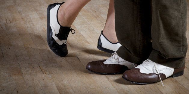 Close up of older couples dancing shoes