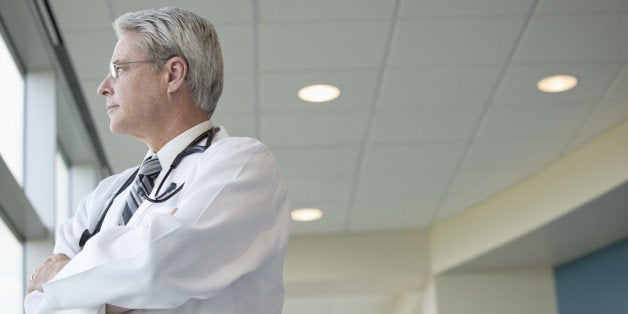 Caucasian doctor standing in hospital