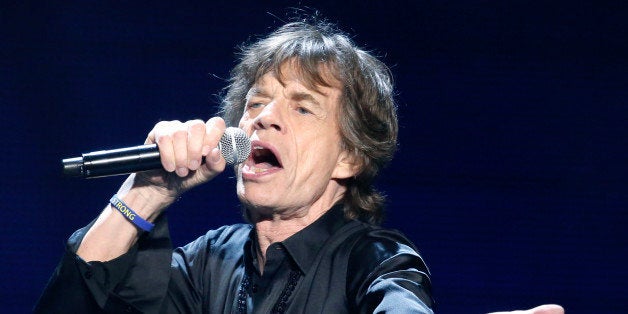 Mick Jagger of the Rolling Stones performs in concert at the TD Garden arena on Wednesday, June 12, 2013 in Boston. (Photo by