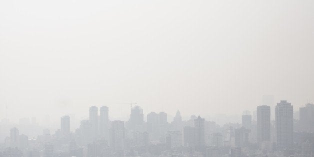 A general view taken from the north of Tehran shows the heavily polluted skyline of the capital on December 31, 2014. Almost